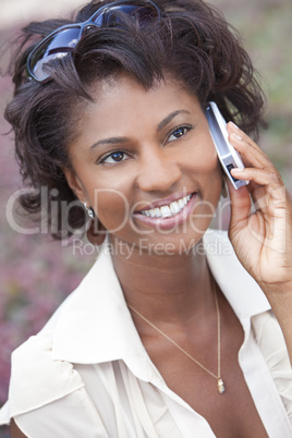 Happy African American Woman Talking on Cell Phone