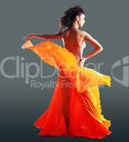 beauty naked woman dance in orange veil