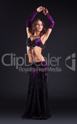 young beauty woman posing in arabic dance