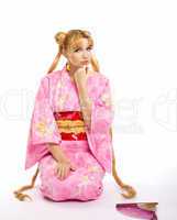 Young woman in kimono cosplay costume