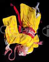 Beauty girl lay in yellow kimono cosplay costume