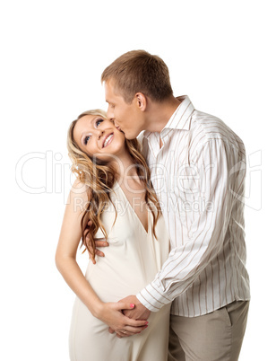 Young couple in white wait for baby kiss a whife