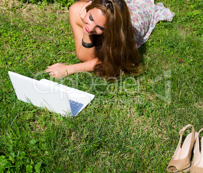 Beautiful girl with a laptop outdoor Beautiful girl with a laptop outdoor