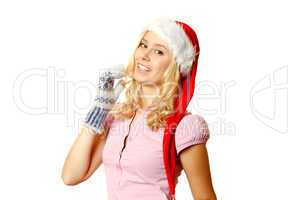 Woman in warm mittens and a red Santa Claus hat