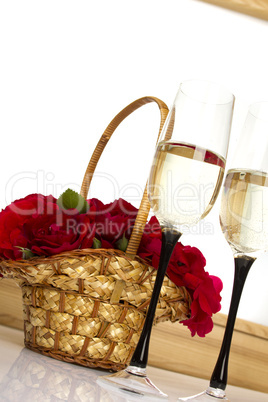 Basket with roses and champagne