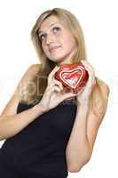 Smiling Young Woman Holding a Heart