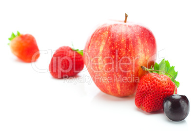 big juicy red ripe strawberries,cherry and apple isolated on whi