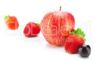 big juicy red ripe strawberries,cherry and apple isolated on whi