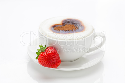 cappuccino in a cup in the shape of hearts and strawberries isol