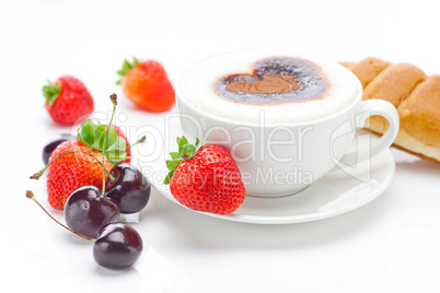 cappuccino in a cup in the shape of hearts,cherry,croissant  and