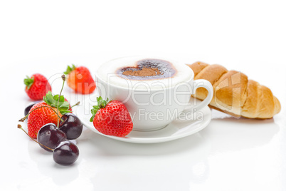 cappuccino in a cup in the shape of hearts,cherry,croissant and