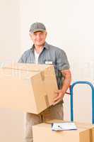 Messenger mature male courier delivering parcels