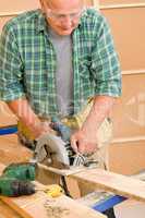 Handyman home improvement cut wood with jigsaw