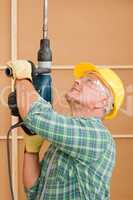 Handyman home improvement working with jackhammer