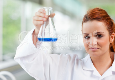 Science student holding an Erlenmeyr flask