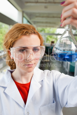 Portrait of a science student holding a flask