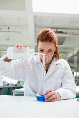 Portrait of a science student doing an experiment