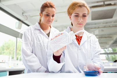 Cute scientists doing an experiment