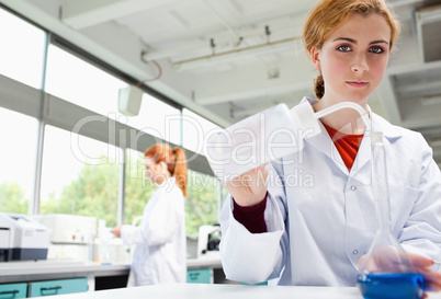 Female science students working