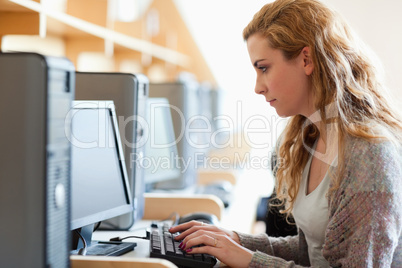 Cute student working with a computer