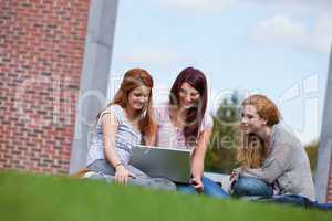 Young women using a laptop