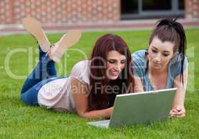 Friends using a laptop