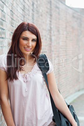 Portrait of a happy student posing