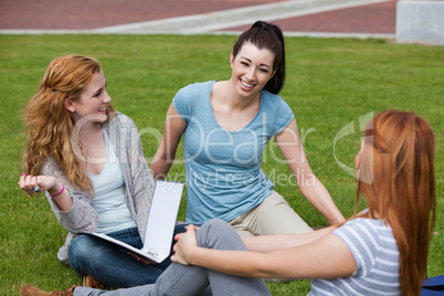 Playful students sitting