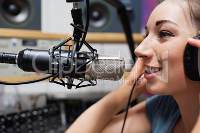 Close up of a young radio host speaking
