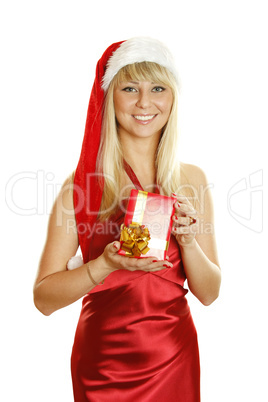 Young woman dressed as Santa with a gift.