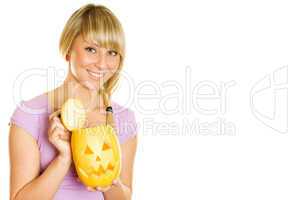 Young woman with a pumpkin for Halloween