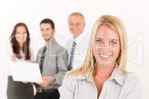 Business woman pretty with colleagues posing