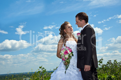 Wedding couple in sunny summer day