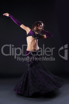 beauty girl in oriental purple arabic costume
