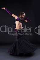 beauty girl in oriental purple arabic costume