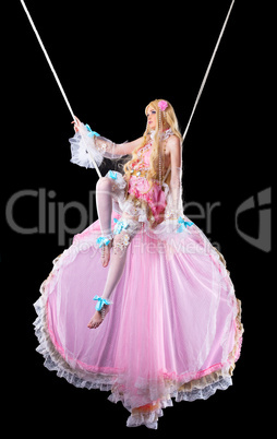 Pretty girl in fary-tale doll costume fly