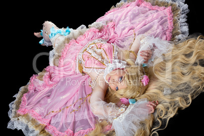 Young woman posing in ball joint doll costume