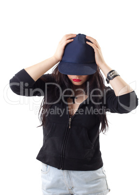 young woman in grunge style with baseball cap