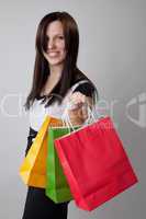 happy shopping girl holding bags