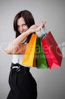 happy shopping girl holding bags