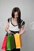 happy shopping girl holding bags