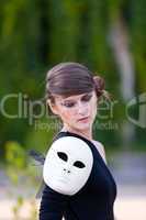 Caucasian girl with closed eyes in black dress