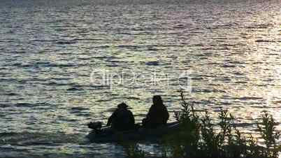 inflatable boat sails along the coast