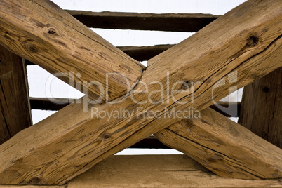 wooden cross in old roof