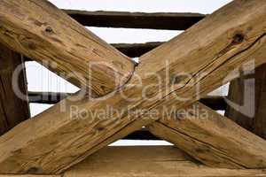 wooden cross in old roof