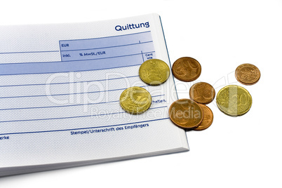 receipt with euro coins and ball-pen