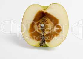 feculent apple rotten from the center - with clipping path