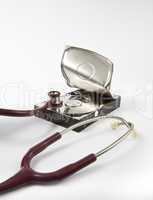 Open hard drive with stethoscope