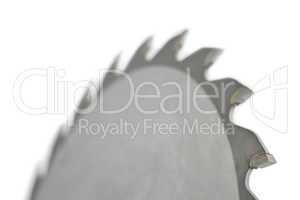 Close up of saw blade on white background