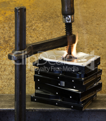 pressed hard drives with clamp and fire